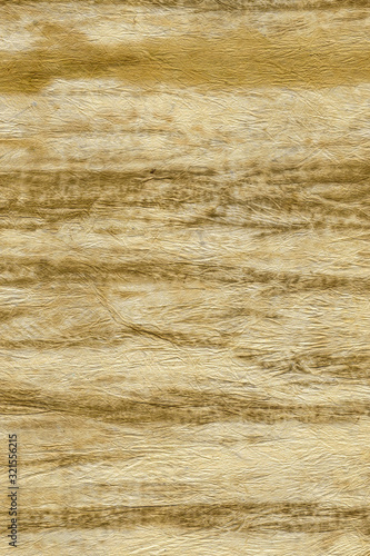 Abstract background of empty brown scratched, crumpled old paper or parchment with textured surface. Use to design or place text.