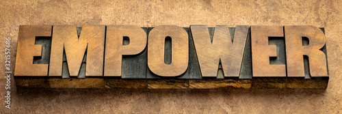 empower word in vintage wood type