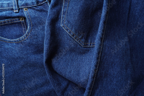 Jeans background. Denim jeans texture. Blue denim pattern. © YanaKho