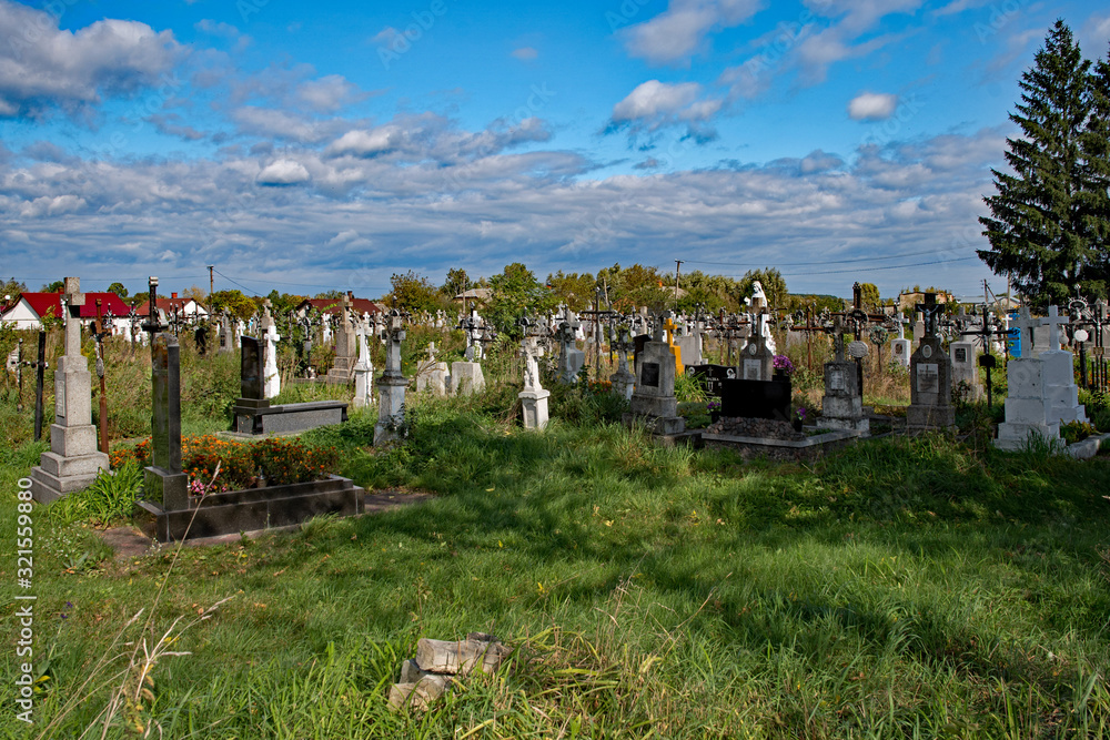 gravestones in graveyard on a cemetery at Volya-Vysotska near Lviv,