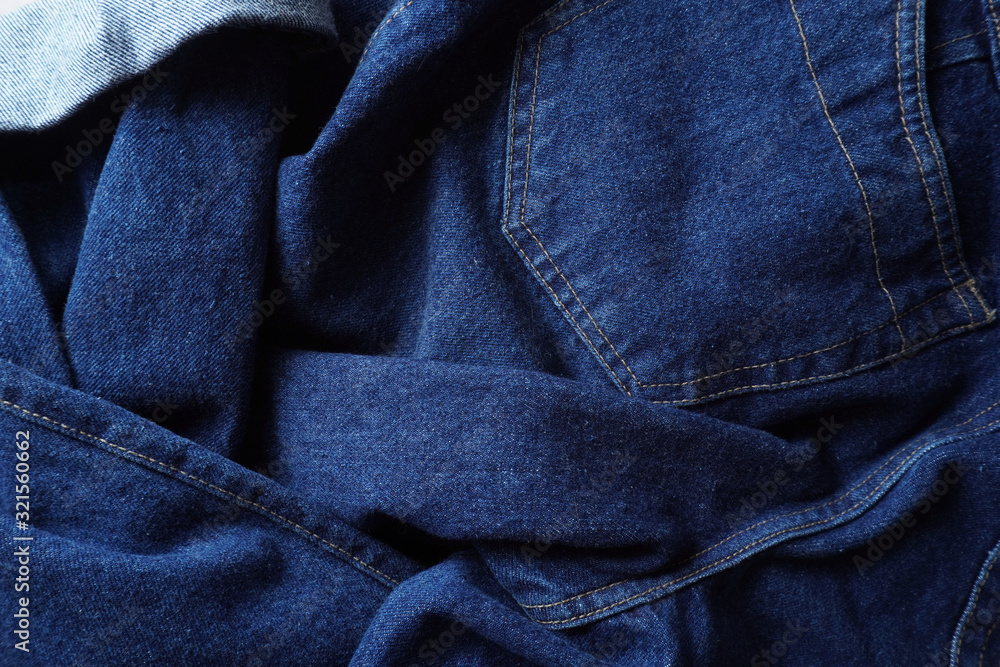 Fototapeta premium Jeans background. Denim jeans texture. Blue denim pattern.