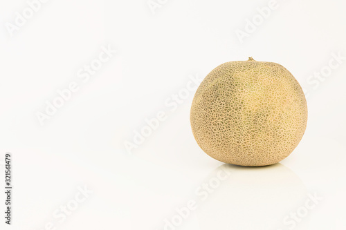 Yellow melon on a white background in the horizontal format
