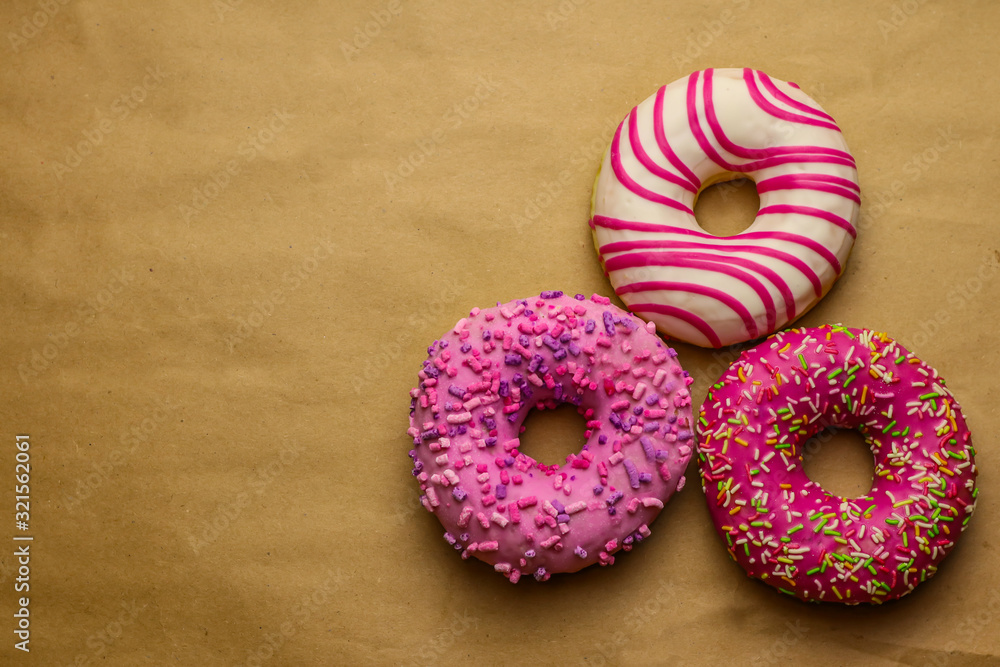 Tasty donut on brown background Tasty donut on brown background