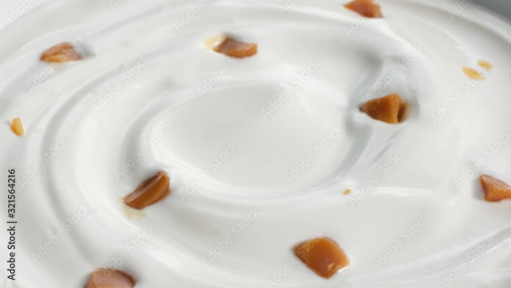 rotating sour cream or greek yogurt swirl with caramel pieces