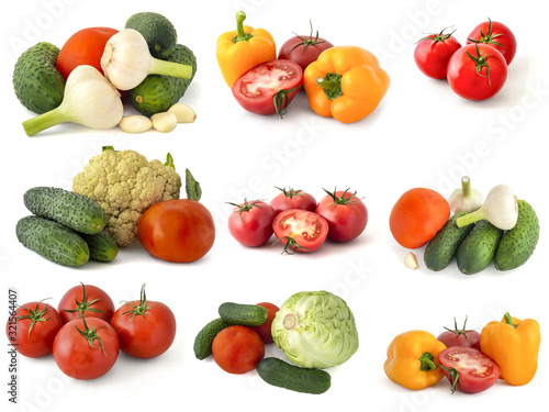 Different ripe delicious vegetables on a white background cabbage broccoli tomatoes bell peppers onions cucumbers garlic on a white background