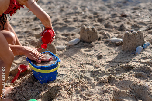Building a sandcastle on the beach