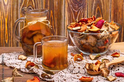 Fototapeta Naklejka Na Ścianę i Meble -  Rural still-life - compote with dried fruits from apples and pears close-up, selective focus