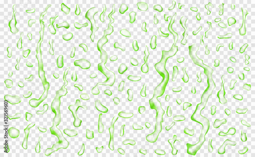 Set of translucent drops and streaks of water in green colors in various shapes, isolated on transparent background. Transparency only in vector format