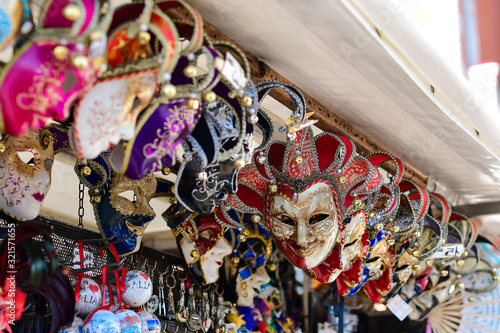Carnival in Venice Italy. Traditional venetian carnival masks in the Italian market for tourists. trip to Italy, carnival 2020. selective focus.