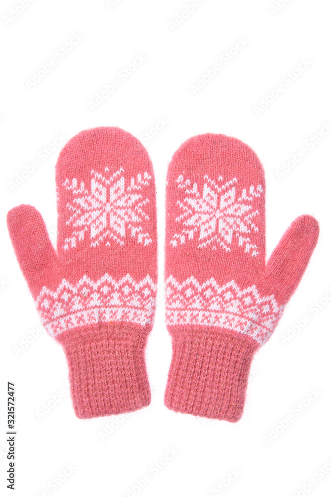 Warm woolen knitted mittens isolated on white background. Pink k Warm woolen knitted mittens isolated on white background. Pink k