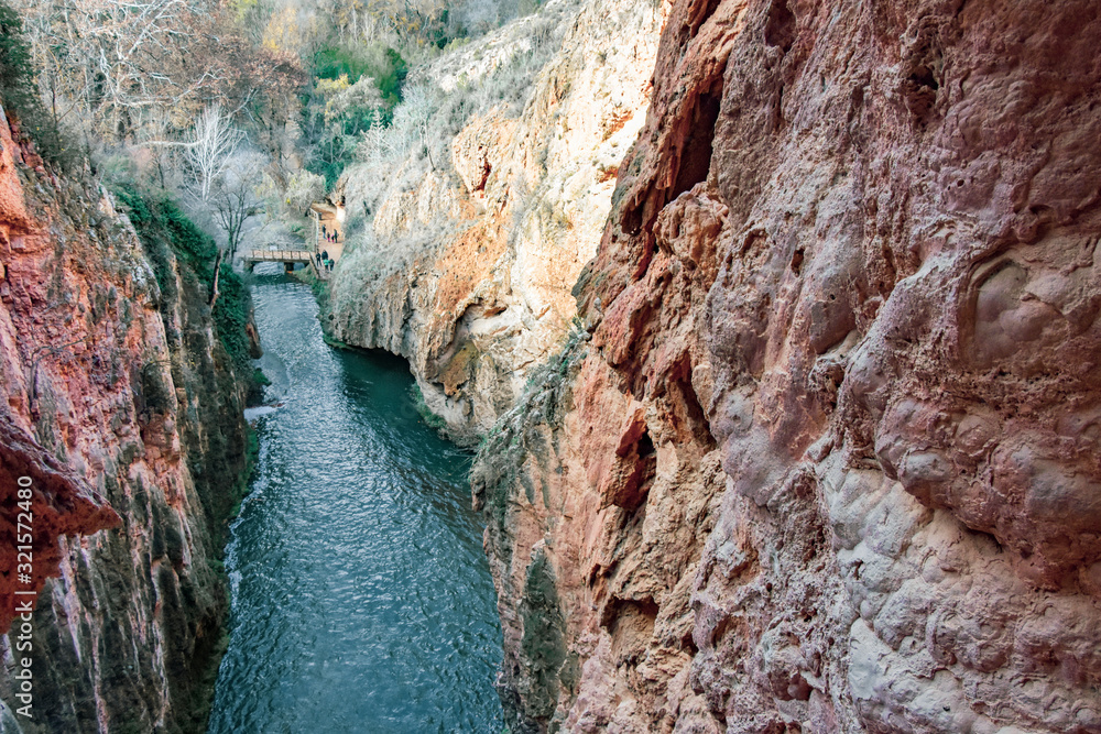 Blue water between red rocks in the mountains of Spain Blue water between red rocks in the mountains of Spain