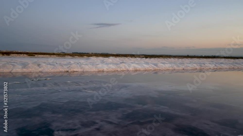 Wallpaper Mural Nature reserve Saline Margherita di Savoia, Apulia, Italy: salt pan at sunset. salt flats area for sea salt production. A salt marsh, a coastal ecosystem on Adriatic sea. Torontodigital.ca