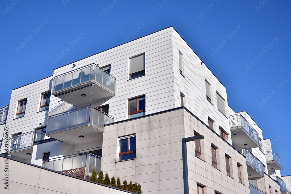 Multistory new modern apartment building with architectural details of modern architecture. Multistory new modern apartment building with architectural details of modern architecture.