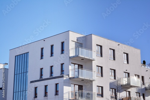 Multistory new modern apartment building with architectural details of modern architecture. 