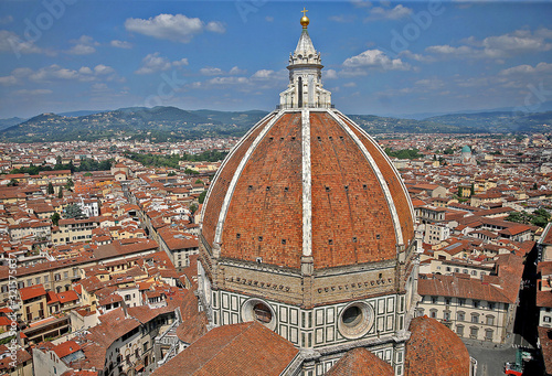 Filippo Brunelleschi's Dome on the Florence Cathedral, or Duomo di Firenze, formerly called Cattedrale di Santa Maria del Fiore, in Florence, Italy. photo