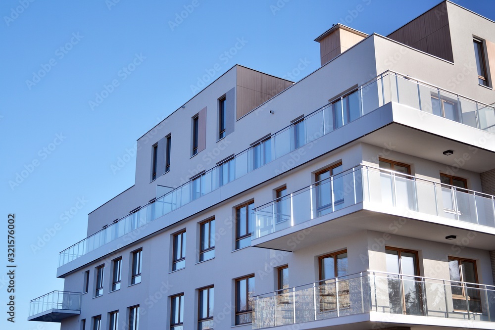 Multistory new modern apartment building with architectural details of modern architecture. 