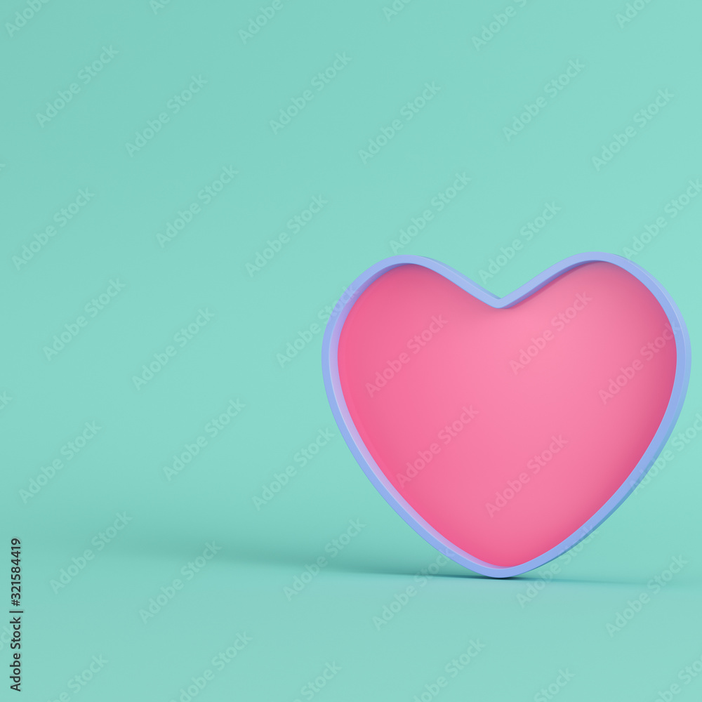Pink heart with blue frame on bright green background in pastel colors. Minimalism concept