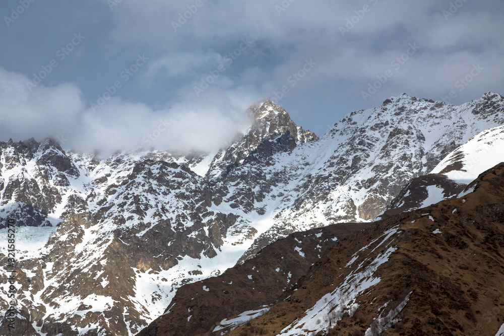 Winter in mountains. The mountain gorge in snow. Landscape of the North Caucasus