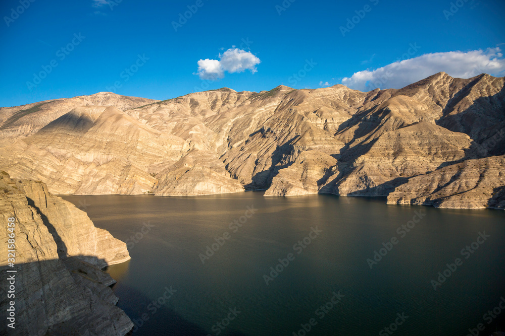 Mountain lake. Beautiful view of the lake with blue water in mountains