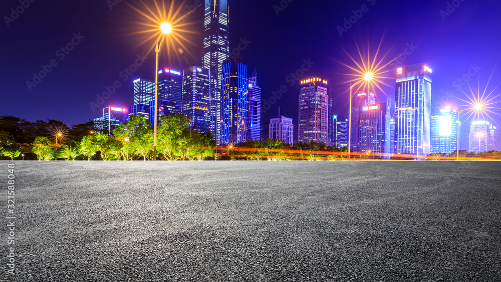Empty asphalt road and Shenzhen city architectural scenery at night,China.