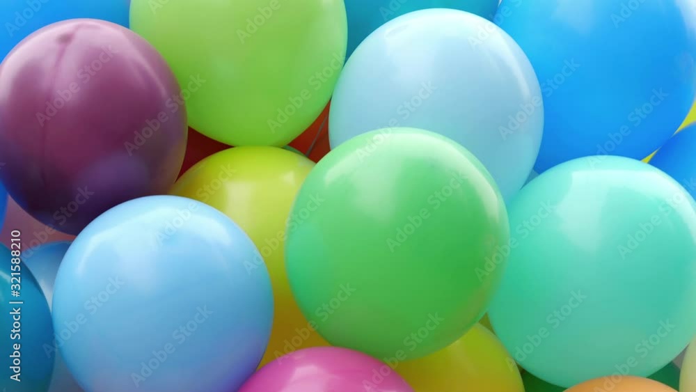 Many colorful balloons flying in the air. Celebration and birthday concept. Many colorful balloons flying in the air. Celebration and birthday concept.