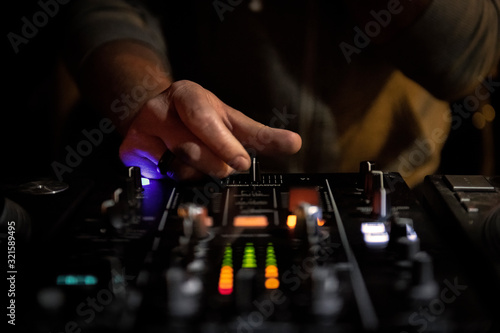 Dj mixing music in club