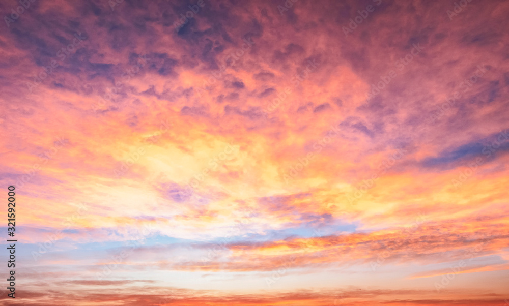 Background of colorful sky concept: Dramatic sunset with twilight color sky and clouds