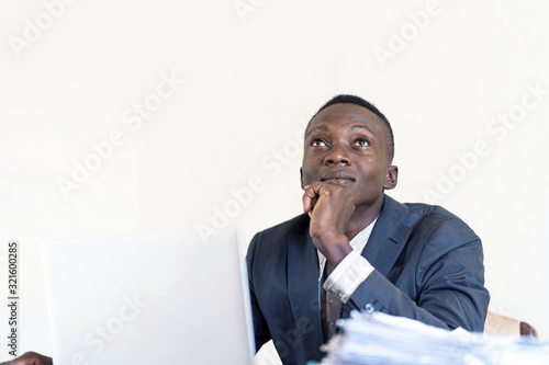 African native charming guy at work ceo in the office