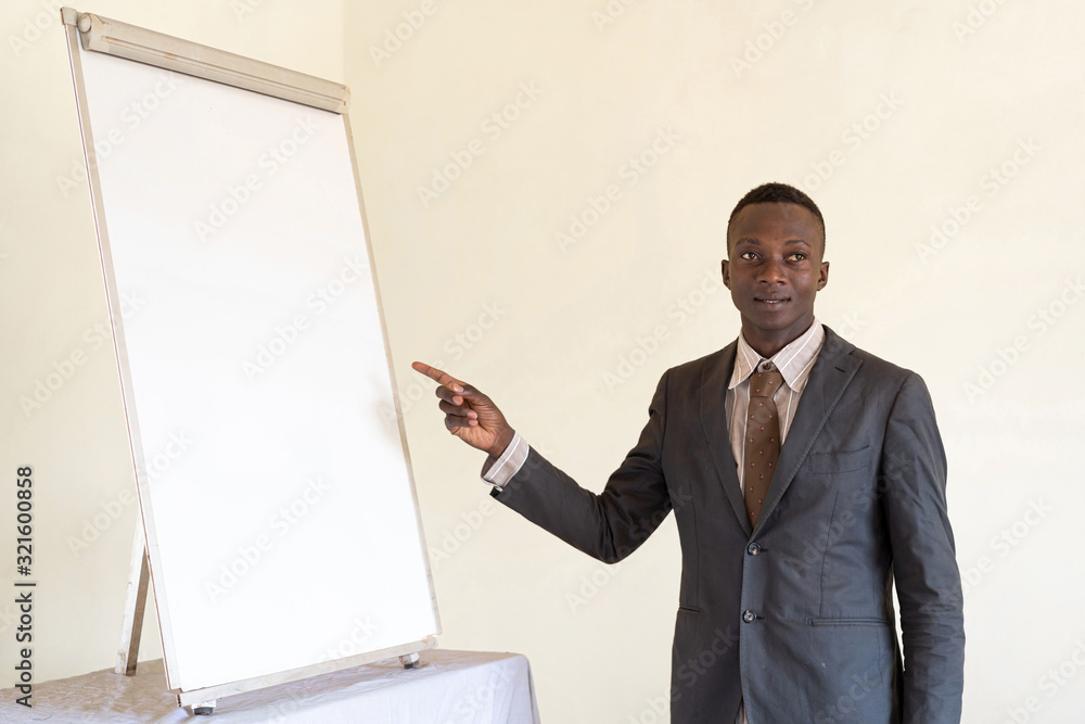 Authentic young Person working boss posing for the camera Authentic young Person working boss posing for the camera