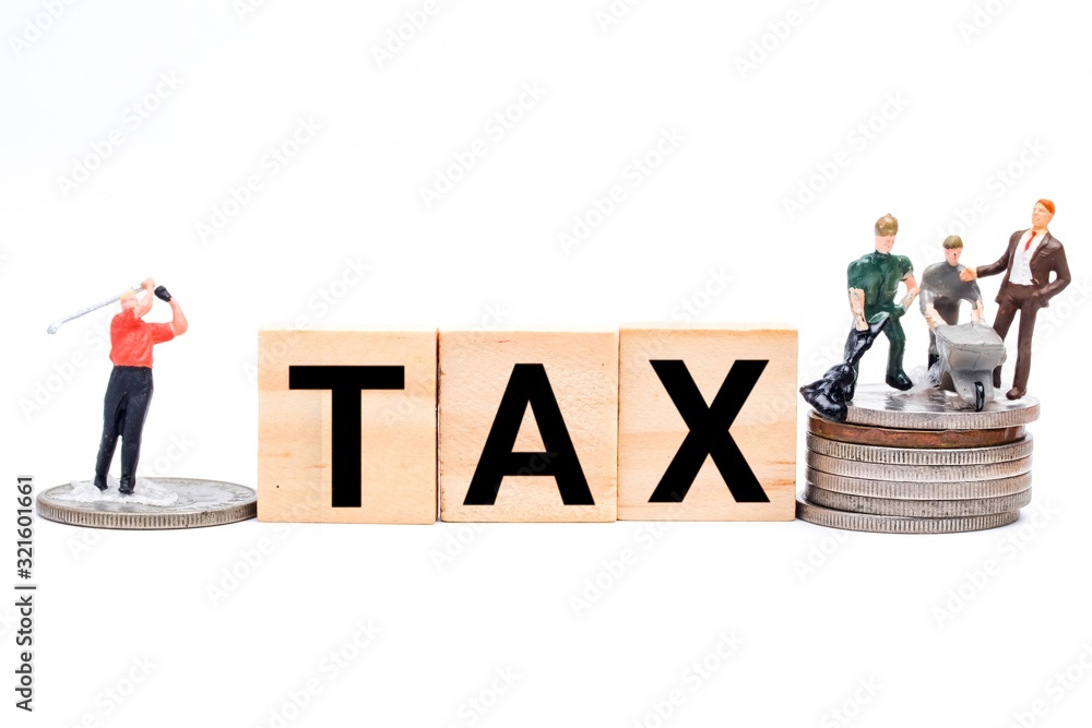 Tax reform concept with wooden tiles, worker and CEO playing golf miniature. In current economy, middle and lower class worker paying high tax compare to higher class. Tax reform concept with wooden tiles, worker and CEO playing golf miniature. In current economy, middle and lower class worker paying high tax compare to higher class.