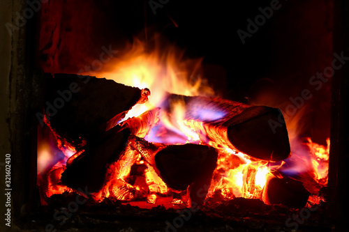 Burning logs inside the oven
