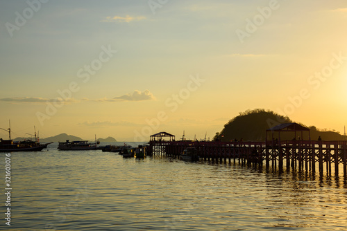 Sunset at Labuan Bajo jetty in Flores Island, East Nusa Tenggara, Indonesia © munettt