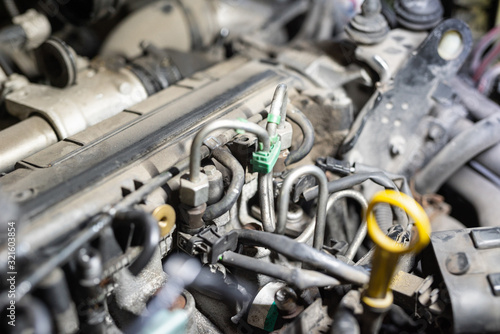 dismantled car engine in a car workshop