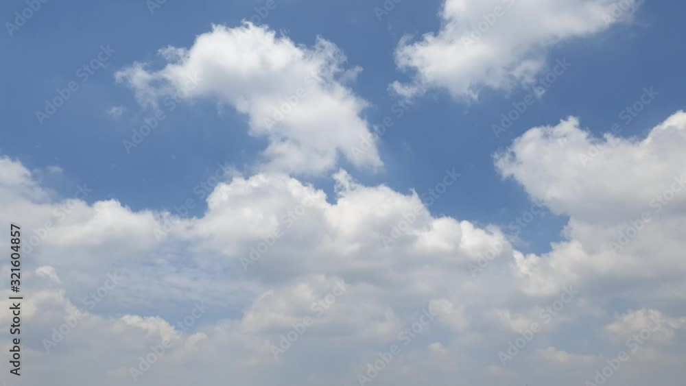 Beautiful blue summer sky with dense thick rain clouds moving across the horizon cloudscape time lapse Beautiful blue summer sky with dense thick rain clouds moving across the horizon cloudscape time lapse
