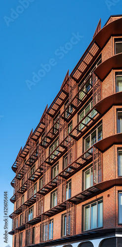 Wall of a modern red brick building. Abstract picture for background