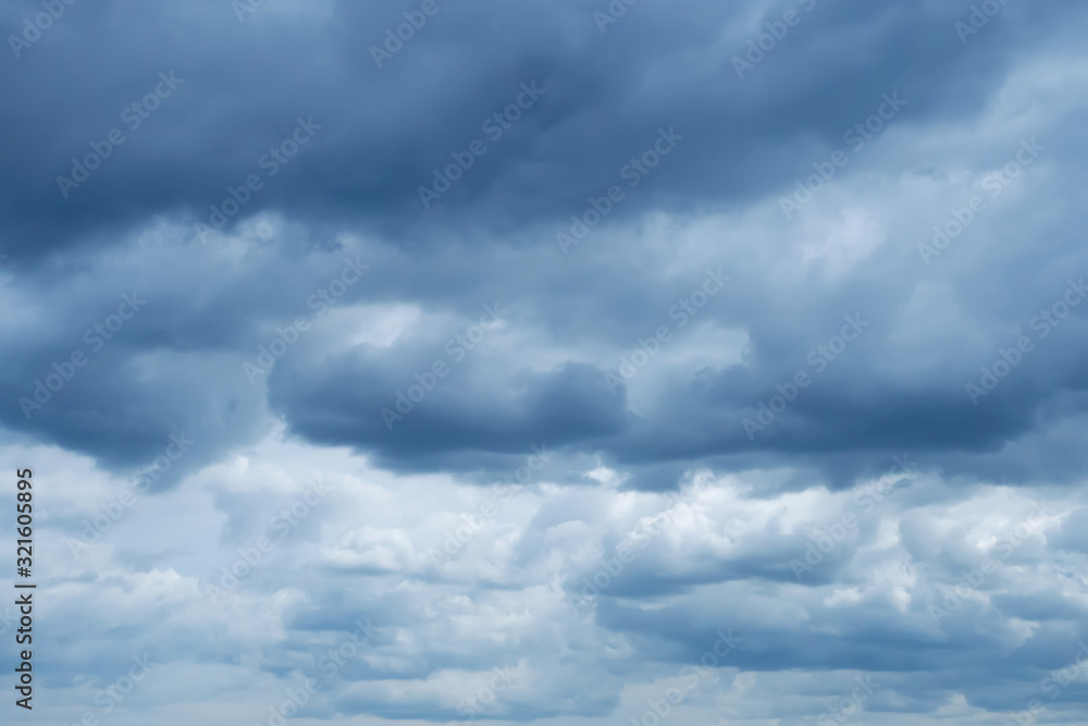 blue sky with soft Cumulus dark blue clouds blue sky with soft Cumulus dark blue clouds