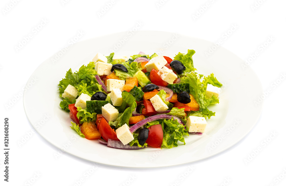 salad of different ingredients on a white plate on a wooden background salad of different ingredients on a white plate on a wooden background