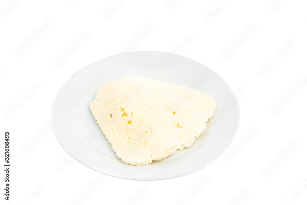 sliced white cheese on a white plate isolated sliced white cheese on a white plate isolated