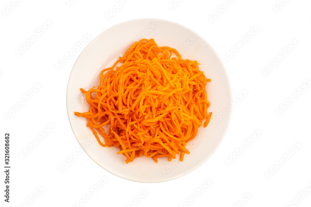 korean carrot as a salad sliced in strips on a white plate isolated korean carrot as a salad sliced in strips on a white plate isolated