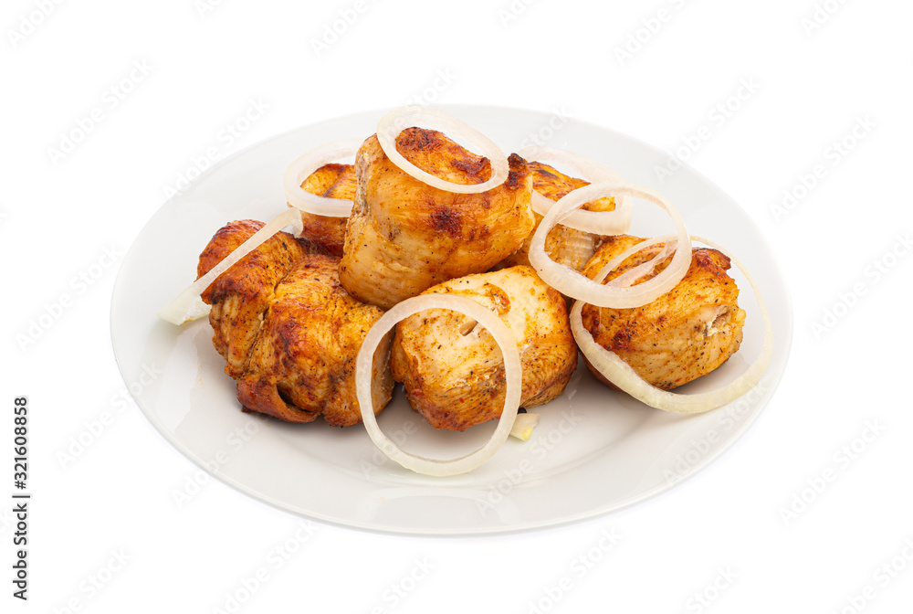 chicken breast skewers with onions on a white plate isolated chicken breast skewers with onions on a white plate isolated