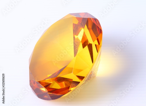 yellow diamond on white surface