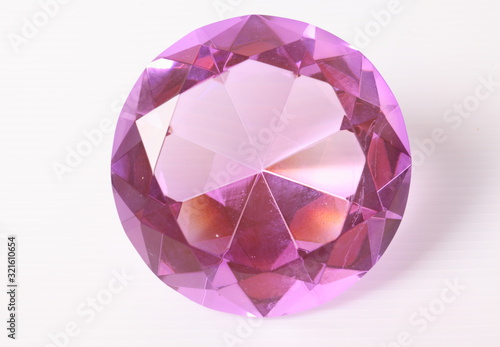 purple diamond on white surface
