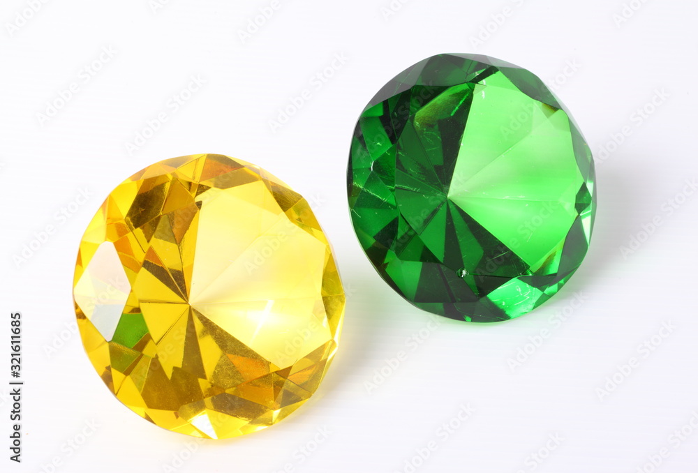 Fototapeta premium Green and yellow diamond on white background