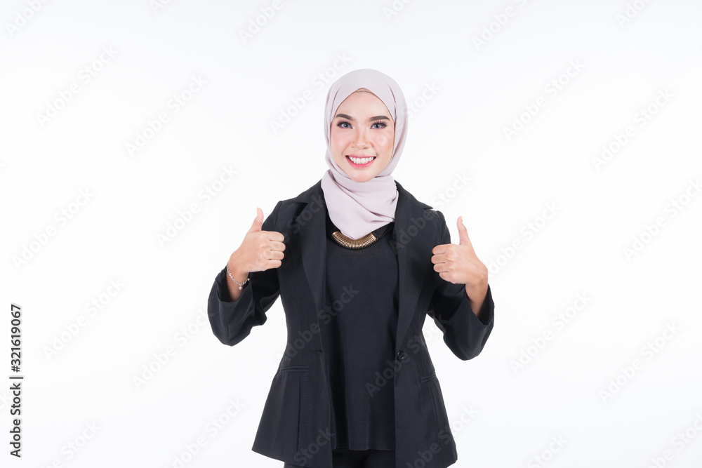 Half length portrait of an attractive Muslim businesswoman wearing hijab with mixed poses and gestures isolated on white background. For image cutout for corporate, technology, business or finance. Half length portrait of an attractive Muslim businesswoman wearing hijab with mixed poses and gestures isolated on white background. For image cutout for corporate, technology, business or finance.