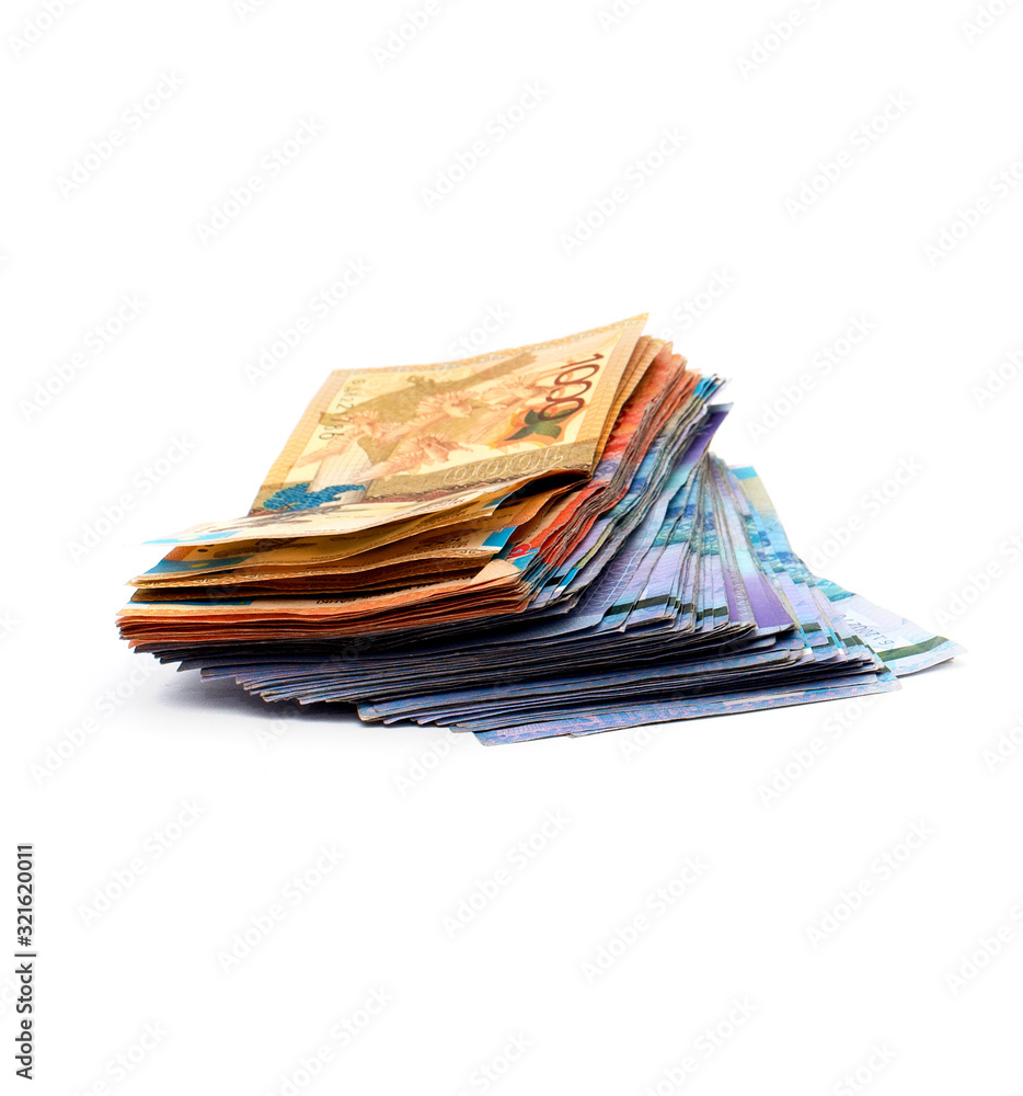 Kazakhstani money with a face value of one, five, ten thousand tenge, on a white background Kazakhstani money with a face value of one, five, ten thousand tenge, on a white background