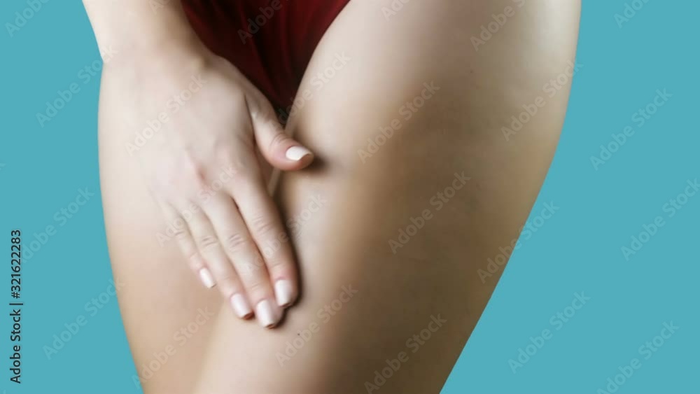 Woman applying moisturizer cream or body lotion on the legs. Body Care. Concept depilation, skincare, cosmetics Woman applying moisturizer cream or body lotion on the legs. Body Care. Concept depilation, skincare, cosmetics