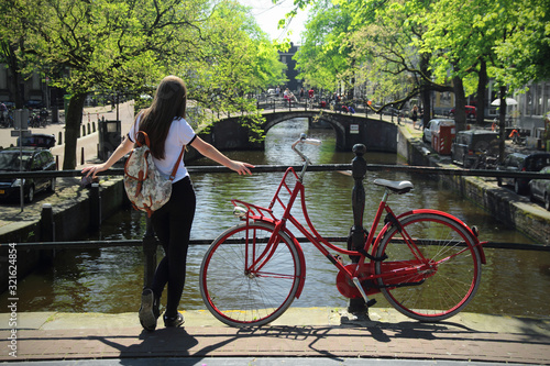 young woman with bicycle