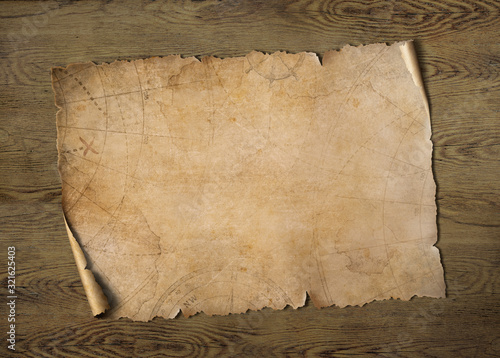 Old treasure map on wood ta...