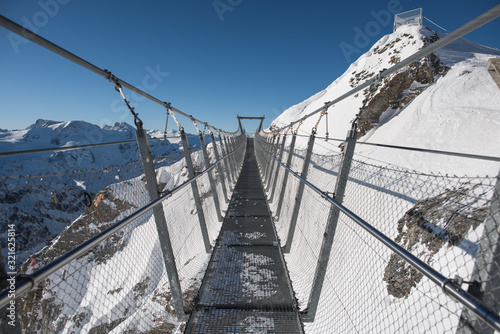 top of mount titlis in engelberg switzerland at morning in winter time. photo