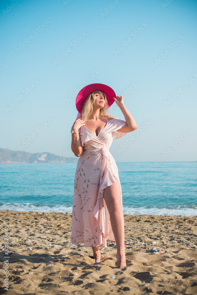 Spring - Summer season. Vacation and travelling time. Woman at sea, pretty nice view Spring - Summer season. Vacation and travelling time. Woman at sea, pretty nice view